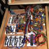 This drawer is loaded with terminals and circuit boards.  The terminals are used for switch machines, track section power, and IR train detectors.  The circuit boards in each drawer control other localized events such as crossing signals.