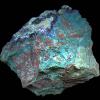 This specimen contains some Azurite (deep blue) with the Chrysocolla.  These are all secondary forms of copper formed by oxidation.